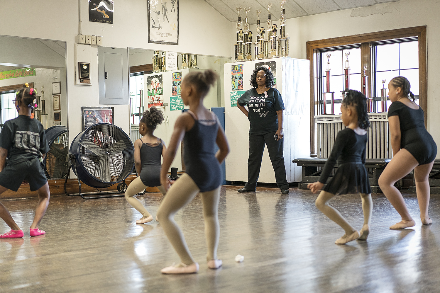 In a small second floor studio in the Berston Field House in Flint, Sheila Miller-Graham (center) watches a young ballet class practice in front of the mirror. At  Creative Expressions Dance Studio, Miller-Graham works to instill a sense of confidenc