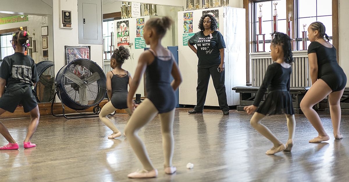 In a small second floor studio in the Berston Field House in Flint, Sheila Miller-Graham (center) watches a young ballet class practice in front of the mirror. At  Creative Expressions Dance Studio, Miller-Graham works to instill a sense of confidenc