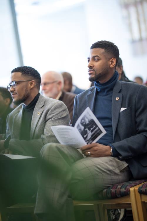 Isaiah Oliver, president of the Community Foundation sits with Ja'Nel Jamerson, executive director of the Flint and Genesee Literacy Network, at the Flint Public Library. 