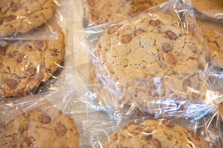 Filled with chocolate chips, walnuts, pecans and caramel, the Million Dollar Cookie still costs just $2. It got it's name from The Cookie Jar owner Teressa Morris' husband who took one bite and proclaimed that it taste like a million bucks.   