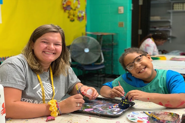 Boys and Girls Club members express themselves with paint in the Art Room during the summer of 2019.
