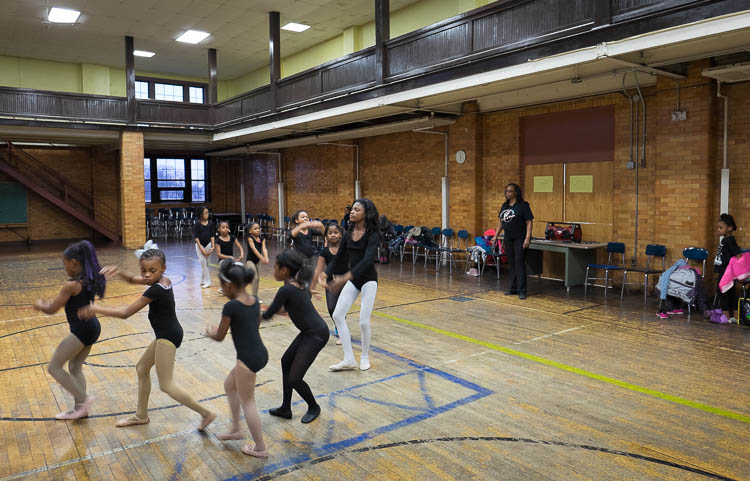 Sheila Miller-Graham (right), director of Creative Expression Dance Studio, runs her Ballet 1 class through a routine in the small gym at Berston Field House.