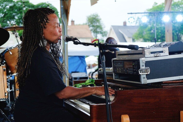 Beverly Davis, head coordinator of the Heritage and Harmony festival, croons while playing the jazz organ on July 4, 2019.