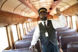 “All aboard,” calls Larry Coleman, conductor at Huckleberry Railroad, to usher guests to their seats for the 40-minute trip from Crossroads Village along the shore of Mott Lake and down the historic Pere Marquette railbed.