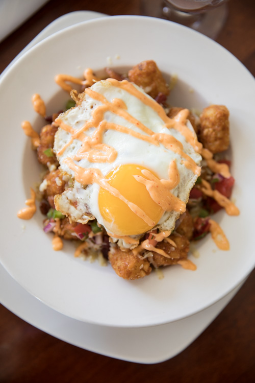 Cork on Saginaw's brunch menu includes a few specialties including these breakfast tots.