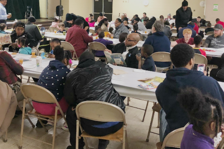 About 60 fathers and their children enjoyed Donuts with Dad at Durant-Tuuri-Mott Elementary School. Then, the dads signed up to be volunteers. 