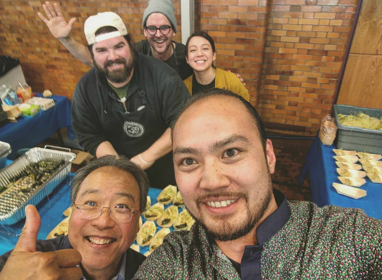 Yo-Yo Ma hams it up with the crew at MaMang, one of the Farmers' Market food vendors serving up samples at Berston.