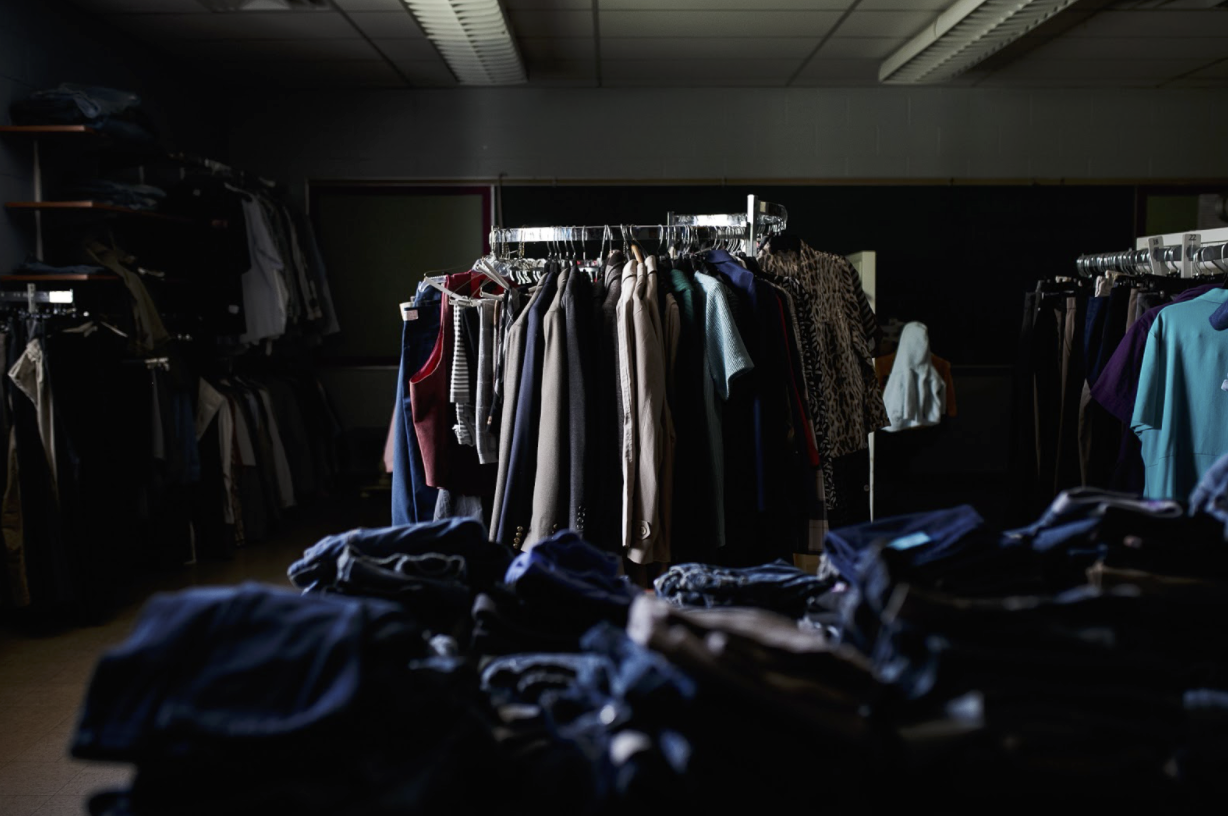 Clothes are displayed like a retail store inside of the Clothes Closet at Franklin Avenue Mission.