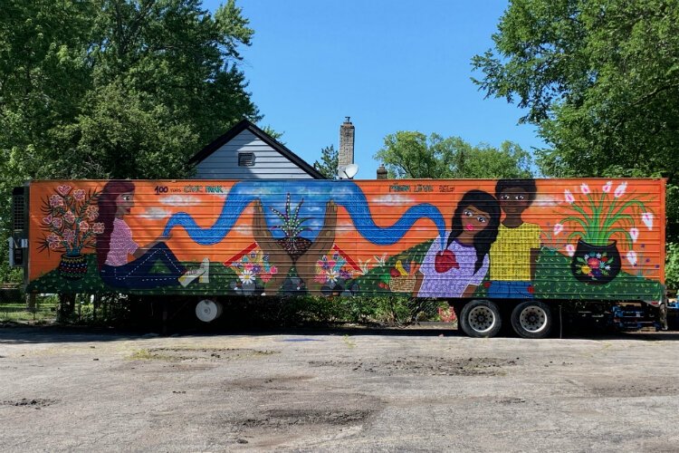 A look at the completed mural on the Joy Tabernacle water distribution trailer.