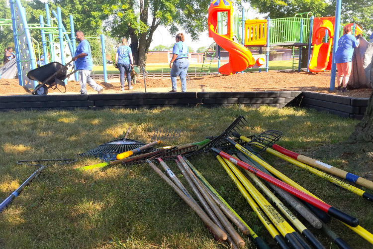 More than 100 volunteers helped to ready the new playground at Hasselbring Senior Center before it opened on Tuesday. 