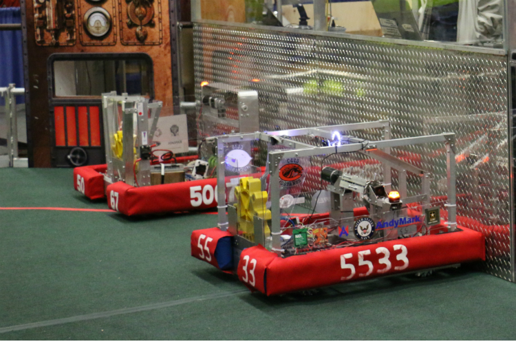 Robots line up at the start of competition at the FIRST Robotics district games at Kettering University in March. 