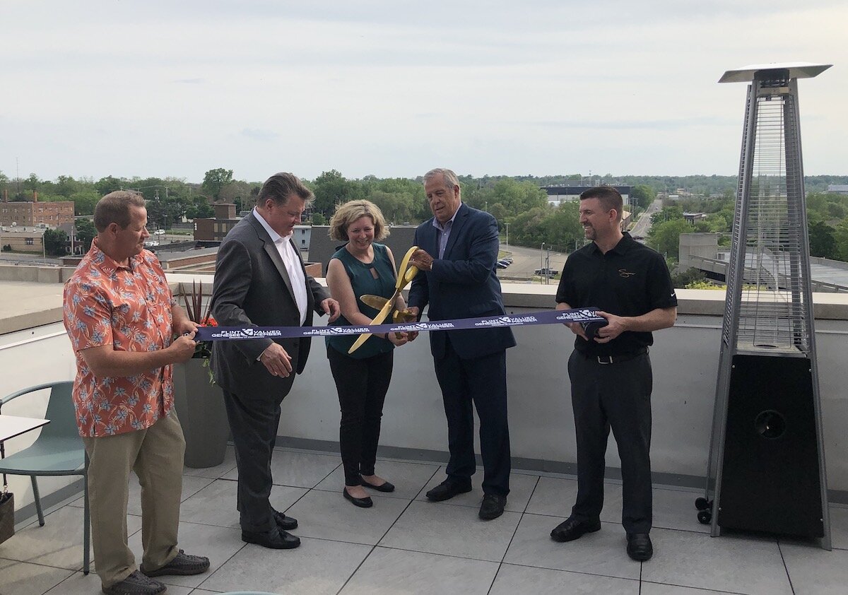 A ribbon cutting ceremony for Simmer Rooftop Lounge was held on May 20.