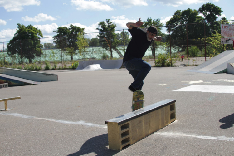 A skater that goes just by Carlos, from Traverse City slides along a rail. “I always come back to skate Flint because of the people,” he said.