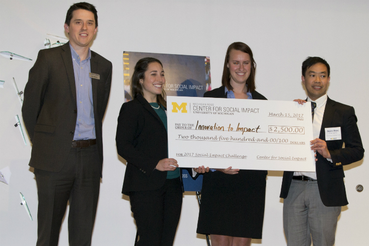 The winning team, Innovation to Impact, took home a won a $2,500 prize. Martha Fedorowicz partnered with students Emily Futcher and Dean-Mark Clemente to develop their plan focusing on downtown training and neighborhood outreach. 