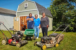 Willie Smith and fellow members of the West Pulaski Street Block Club stand in front of their community tool shed built with a $5000 grant awarded by Community Foundation of Greater Flint Neighborhoods Small Grants Program.