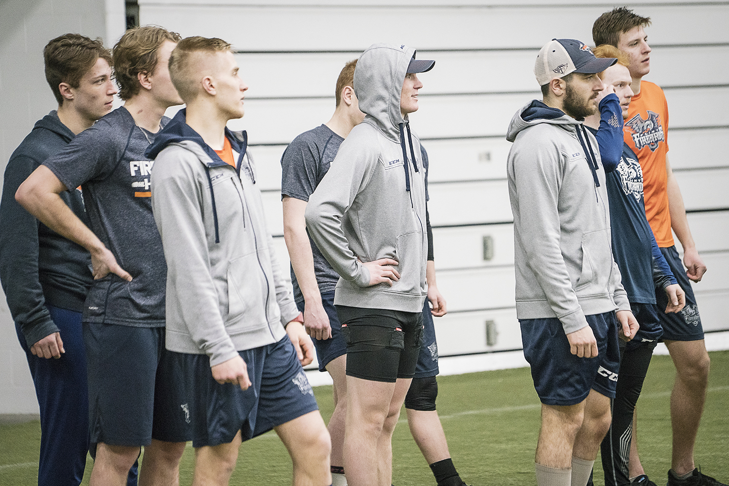 Flint, MI - Tuesday, January 30, 2018: Flint Firebirds' Center Ty Dellandrea (center), 17, stands amongst his teammates during post-practice recovery at the Dort Federal Event Center.