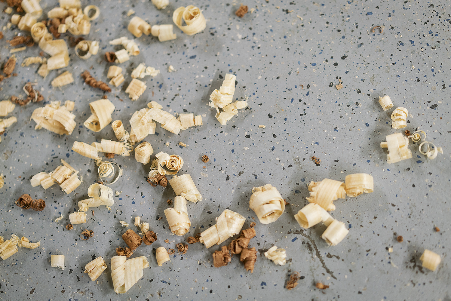 Flint, MI - Friday, February 2, 2018: Curled wood shavings rest on the floor waiting to be swept up at Factory Two in Flint..