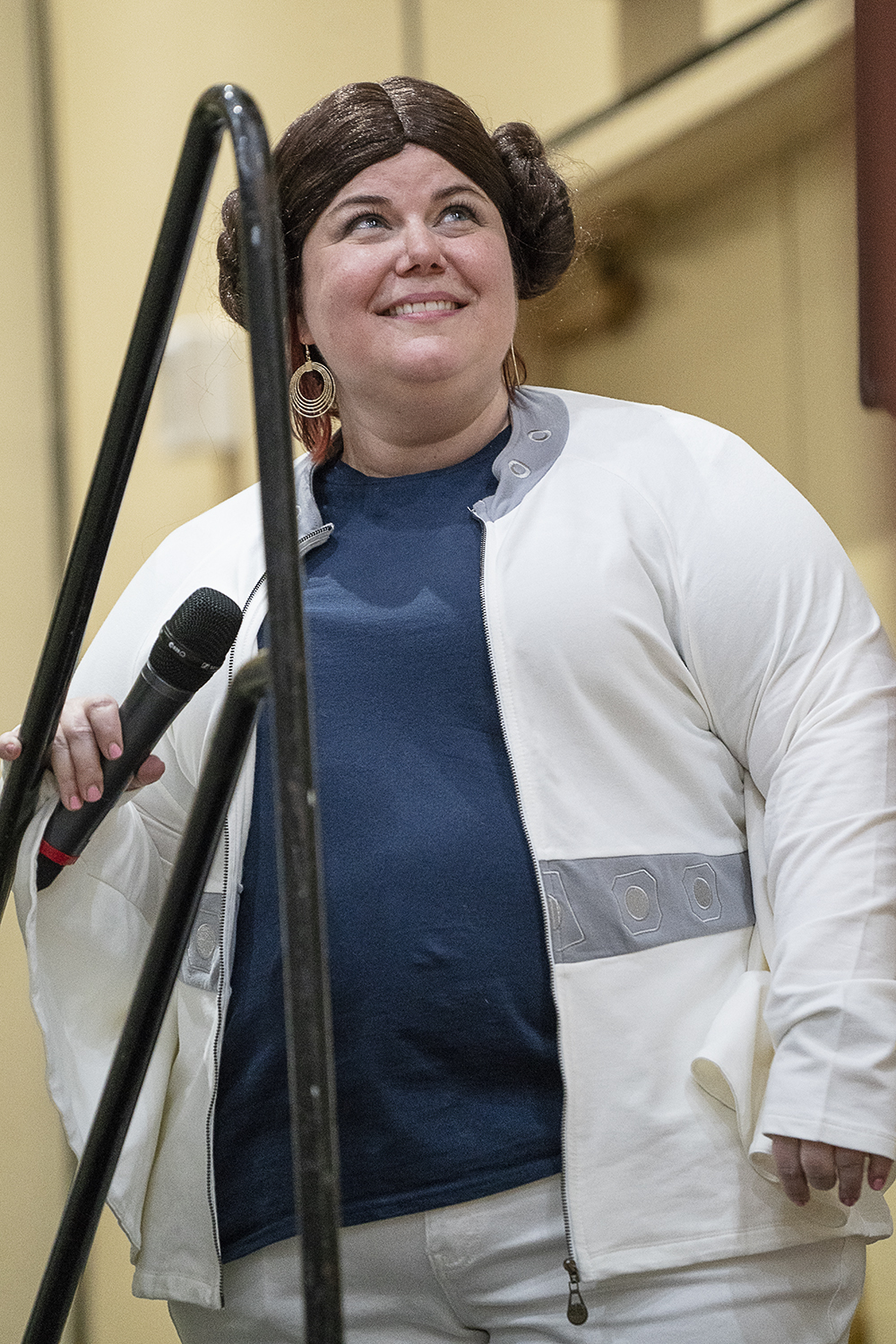 Flint, MI - Friday, May 4, 2018: FlintSide publisher and Flint resident Marjory Raymer, 44, smiles as she watches a short slideshow before taking the stage at the 5th Annual Blueberry Ambassador Awards Party at the Riverfront Banquet Center downtown.