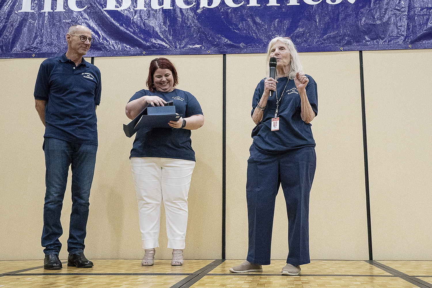 Flint, MI - Friday, May 4, 2018: Grand Blanc Perry Innovation Center teacher Vickie Weiss (right) speaks to the Blueberry Ambassadors after receiving the Blueberry Ambassador Inspirational Teacher Award during the 5th Annual Blueberry Ambassador Awar