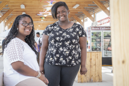 Flint, MI - Thursday, June 7, 2018: Raven Hullum, 14, (left) and Erin Long, 17, creators of Loving Me Inc., have their photograph taken at the Flint Farmers' Market downtown.