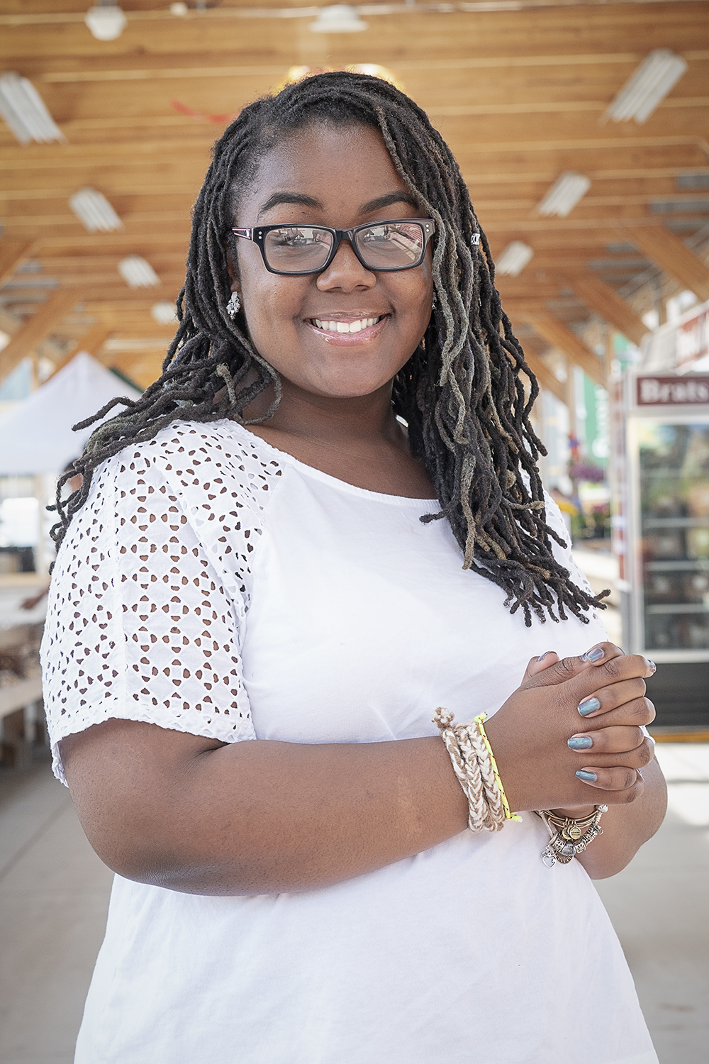 Flint, MI - Thursday, June 7, 2018: Raven Hullum, 14, has her portrait taken at the Flint Farmers' Market downtown.