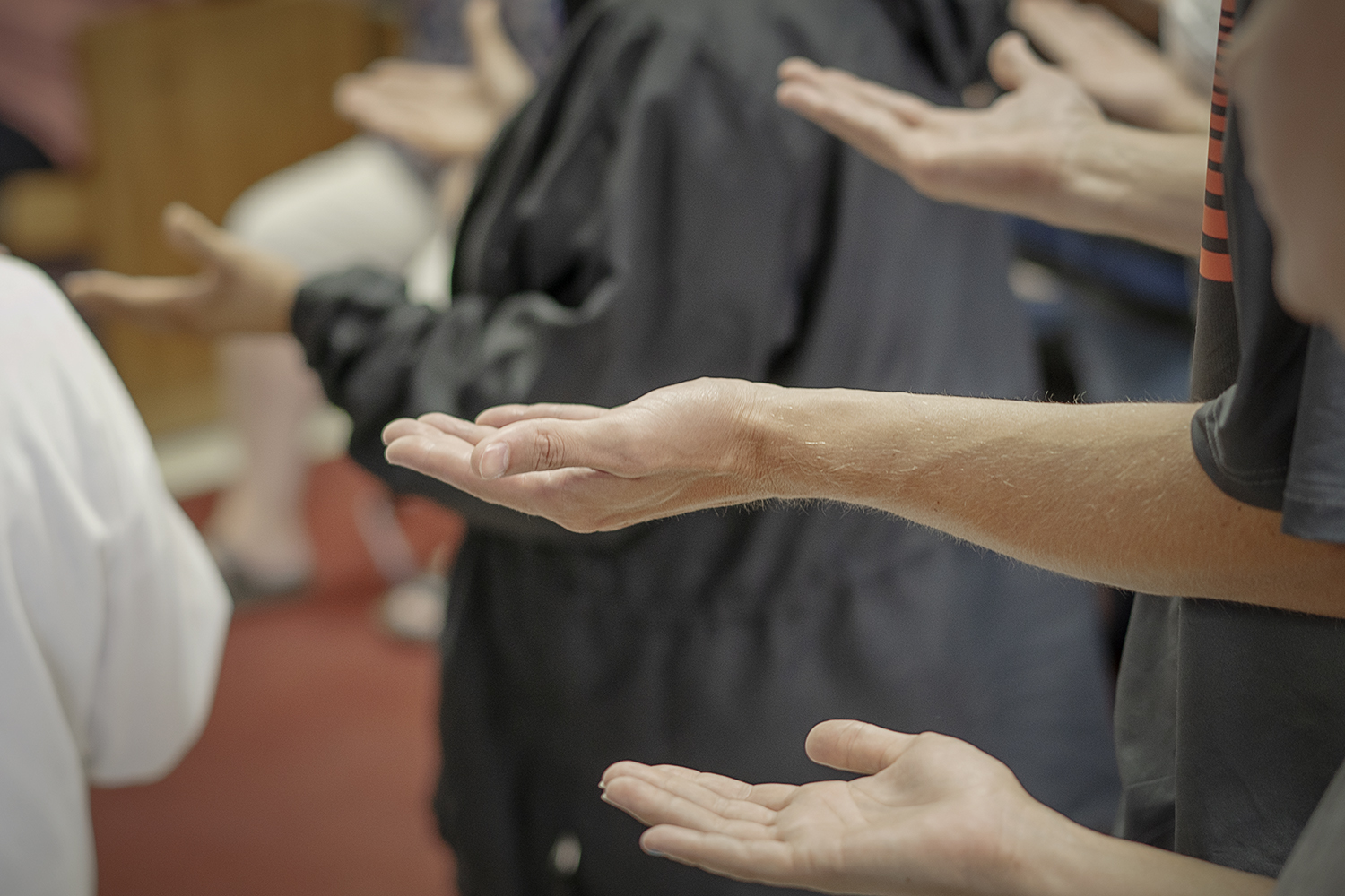 The congregation at Master's House Deaf Church in Flint  prays during a recent service.