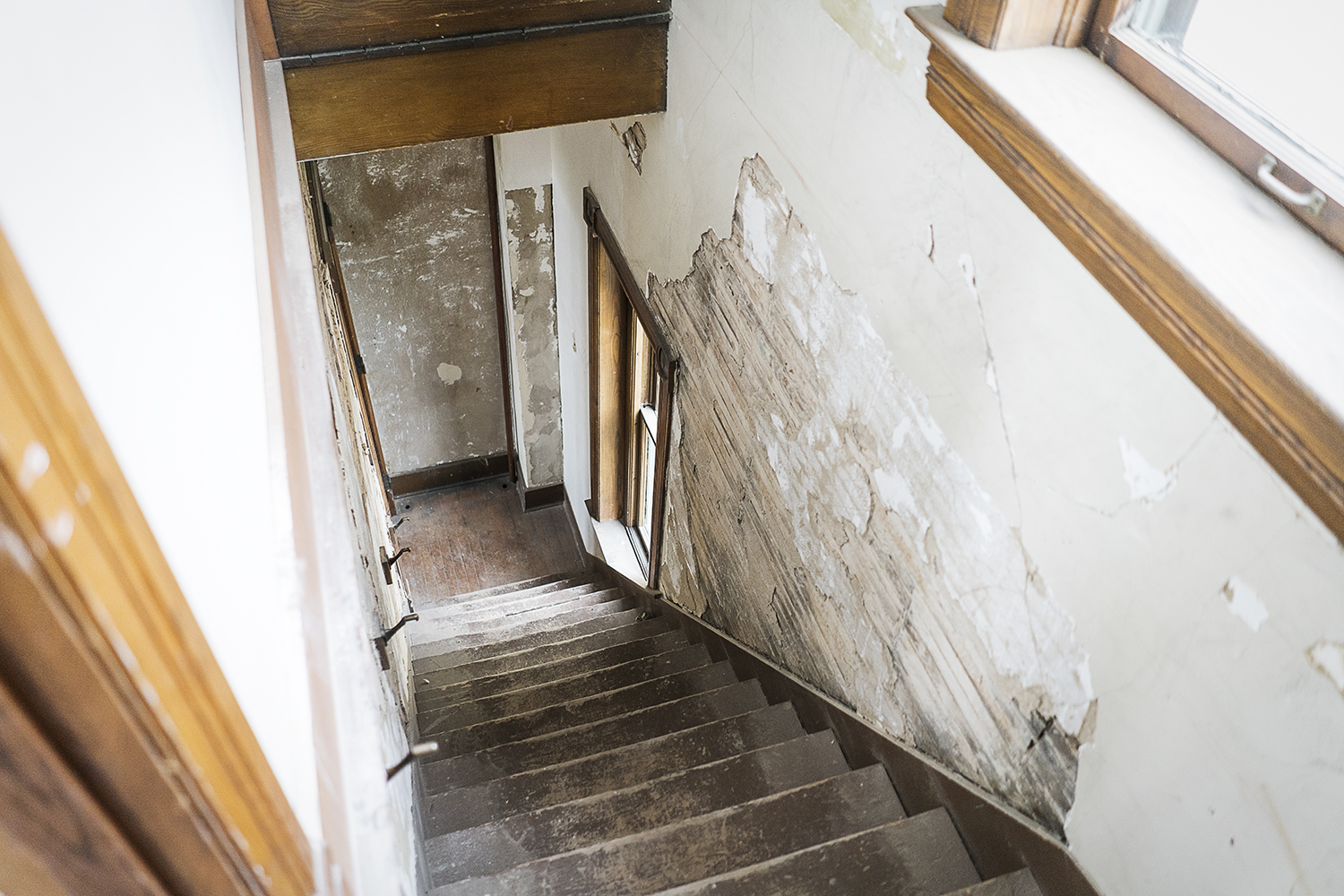 Flint, MI - Tuesday, October 31, 2017: A secondary staircase drops down to the first floor of the Whaley Historic House Museum. 