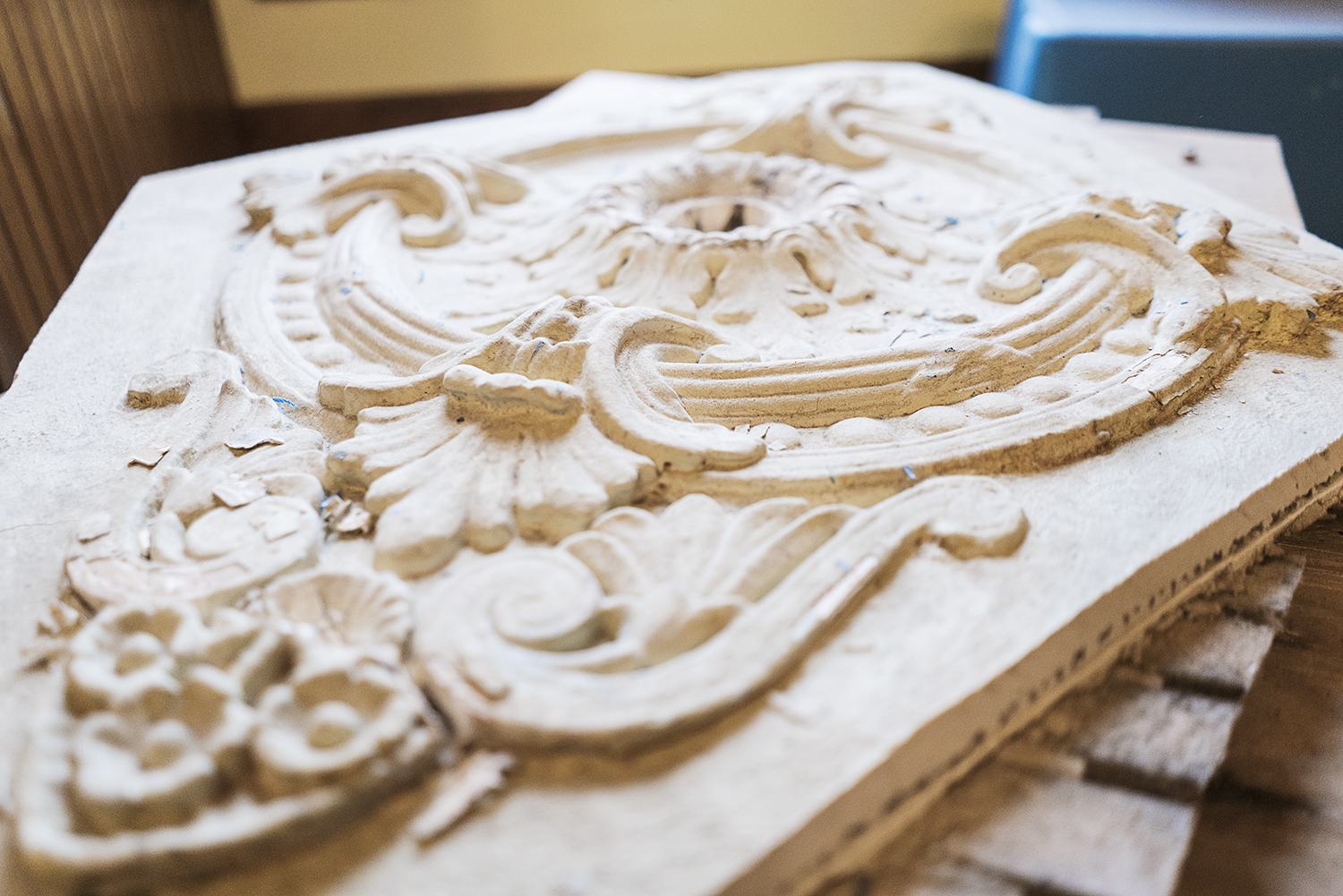 Flint, MI - Tuesday, October 31, 2017: A large, decorative medallion waits to be refinished and hung above a chandelier in the Whaley Historic House Museum.