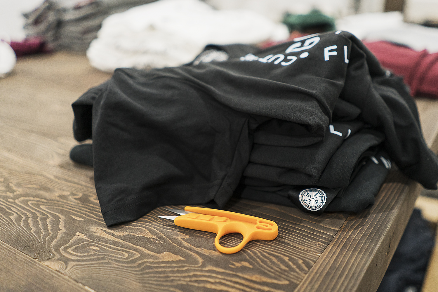 A set of thread snips sits on the main table display in the showroom of the new GoodBoy Clothing storefront in downtown Flint. The team at GoodBoy have been working tirelessly for the upcoming grand opening on Friday, November 17, 2017.