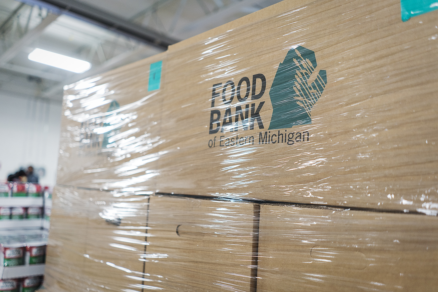 Large boxes full of food for holiday meals await transport at the Food Bank of Eastern Michigan.