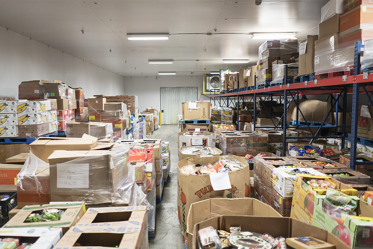 Pallets and pallets full of food wait to be inspected, sorted and shipped in the warehouse of the Food Bank of Eastern Michigan.