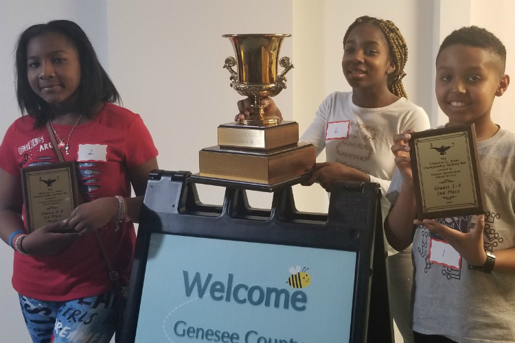 Winners of the fifth-eighth grade championship are first place Aurora Akinpeloye from Grand Blanc East Middle School, followed by Joshua Tewolde from Grand Blanc West Middle School and Kamaria Carter-Ryan from Woodland Park Academy.