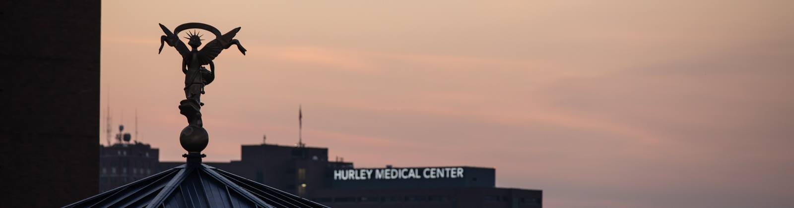 The night sky in Flint, adorned by the sculpture above the UM-Flint pavilion and Hurley.