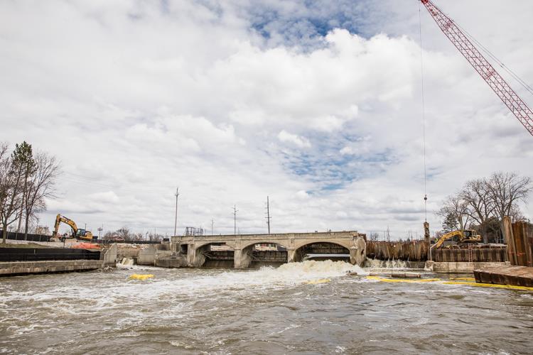 Work continues on the removal of the Hamilton Dam, part of a project designed to revive the Flint River downtown. 