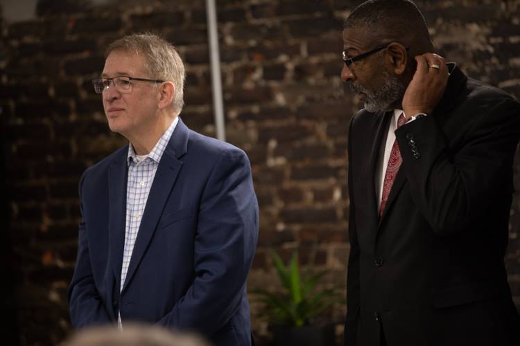 Businessman Phil Hagerman and Flint City Administrator Steve Branch look on during the announcement on Wednesday of the new team name.