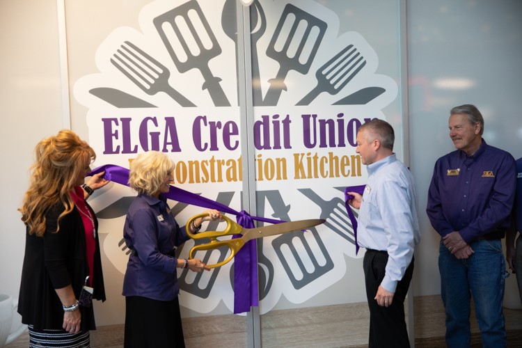 The ribbon cutting for the new ELGA Credit Union Demonstration Kitchen at the Flint Farmers' Market. 