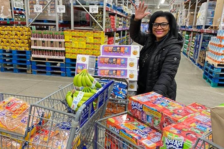 Deria Brown, owner of Glam Boutique, shopping for donations for her free-lunch initiative on Saturday, March 14. 