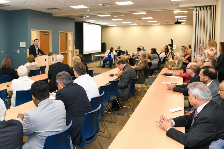 Hurley Foundation President Mike Burnett speaks at the opening of the Abbott Medical Education Center at Hurley. 