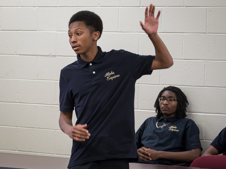 Alpha Esquire Charles Kelley, 15, of Grand Blanc, practices for a spoken word performance.