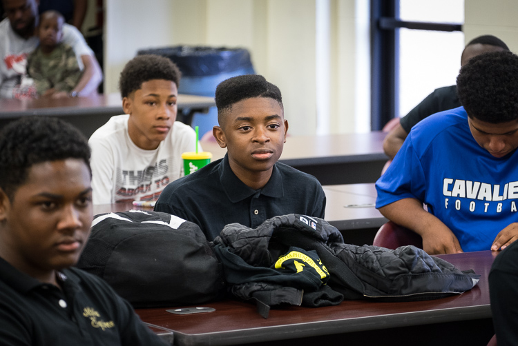 Jemini Green, 17, of Flint, listens during a discussion about human trafficking during a meeting earlier this month of the Alpha Esquires.