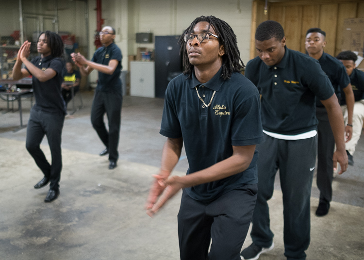 Eric Owens II, 16, of Flint, rehearses a step-dance routine with other members of the Flint Alpha Esquires.