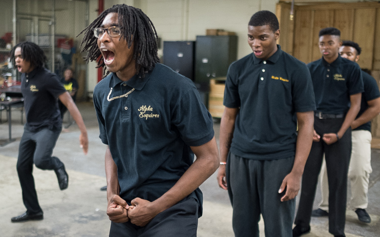 Eric Owens II, 16, of Flint, rehearses a step-dance routine with other members of the Flint Alpha Esquires.