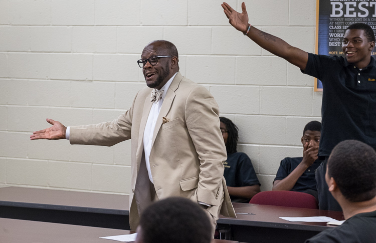 Advisor Sam Wells conducts the Alpha Esquires meeting earlier this month.