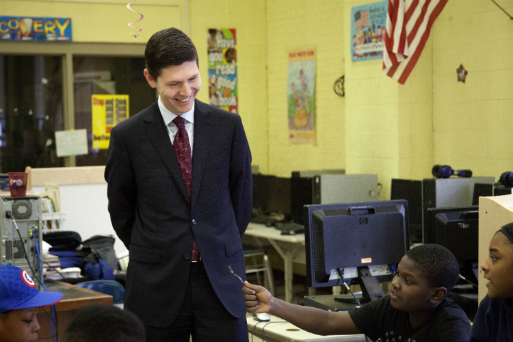 Flint's unique AmeriCorps program grew from about 25 in 2014 to nearly 200 now and drew the attention of national AmeriCorps Director Chester Spellman.