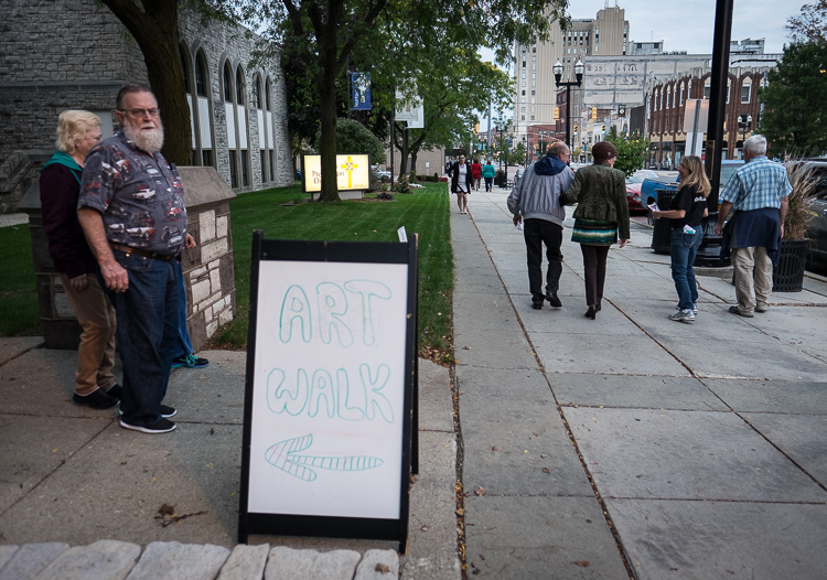 A sign directs visitors into an exhibit at First Presbyterian Church in Flint during ArtWalk. ArtWalk brings visitors from Flint and surrounding communities into more than 20 different venues to view art.