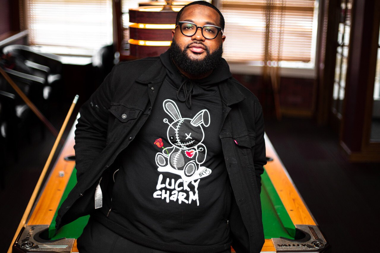 Music artist Baybro, known for his “conversation rap” is pictured inside Soggy Bottom Bar in Flint.