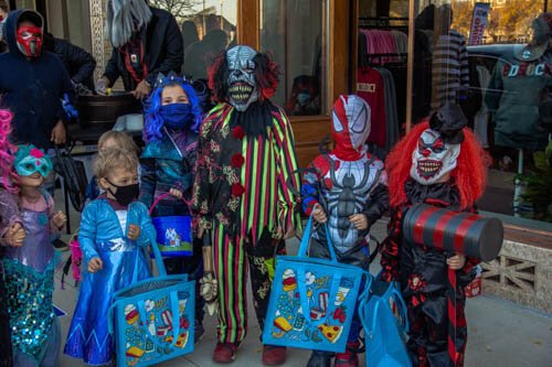 Several downtown businesses teamed up to pass out candy to trick-or-treaters downtown on Halloween. More than 1,000 people attended.