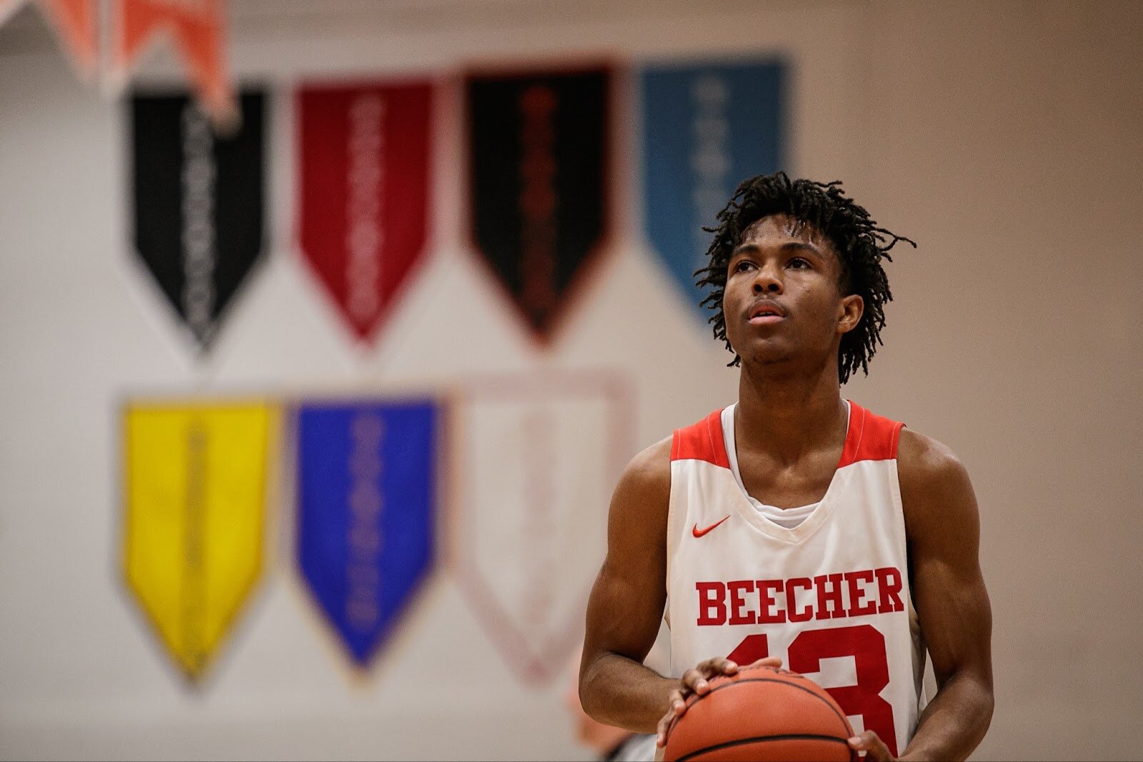 Beecher junior Damarcus Burke takes a deep breath before shooting a free throw during the boys' varsity basketball game on Saturday, Feb. 18, 2023, at the Moses Lacey Fieldhouse in Mount Morris. Beecher defeated Hamady 48-43.