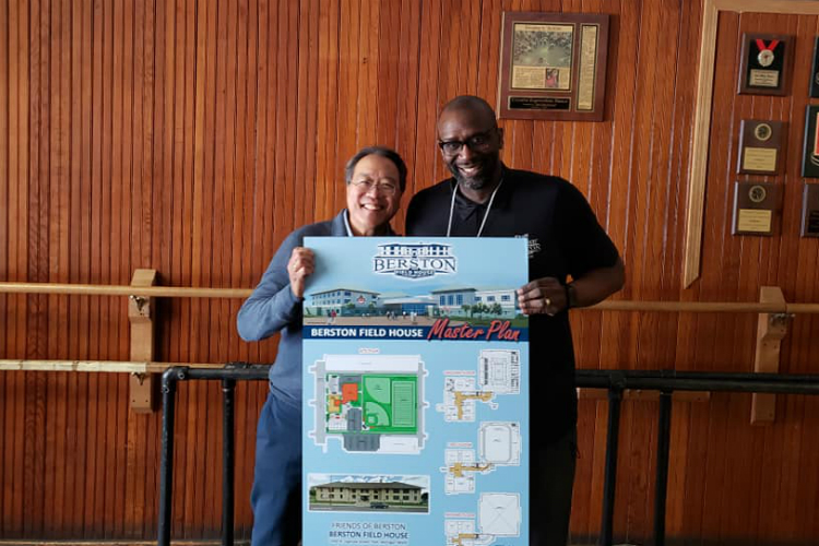 Yo-Yo Ma actively shared his appreciation for Berston Field House as a gathering place for the community. Here he poses with executive director Bryant BB Nolden