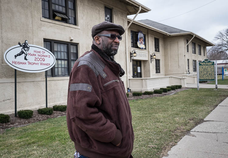 Bryant Nolden, executive director of the Friends of Berston, stands outside the facility on North Saginaw Street in Flint.